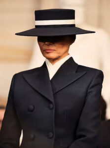 Melania_2025_inagauration_beautiful_navy_coatdress_with_eyes_hidden_under_hat